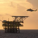 Helicopter landing on oil rig